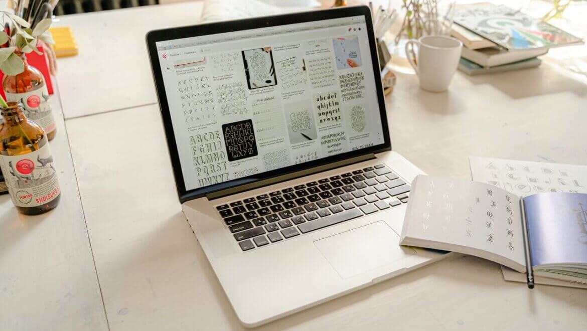 A laptop screen displaying various fonts