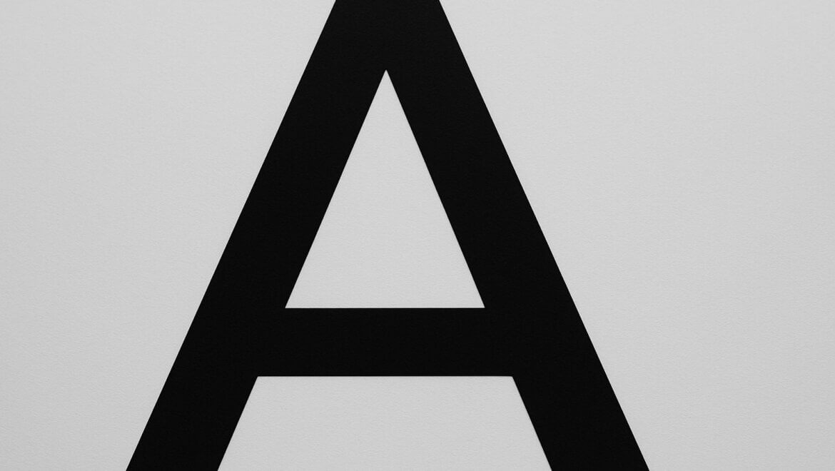 A close-up of a sans-serif letter, highlighting its clean lines.